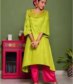 Two piece green colored suit with hand embroidered mirror work long kurti paired with trouser