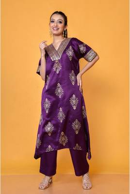 Two piece plum colored hand block print suit with sequence work paired with trouser 1
