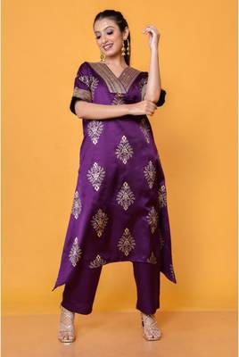 Two piece plum colored hand block print suit with sequence work paired with trouser 3