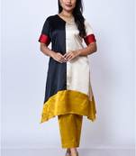 Two piece stylish color block suit paired with contrast trouser