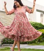 One piece peach colored jaipuri hand block print flared dress with yoke and ruffles