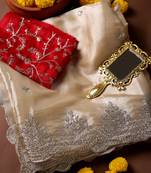 Cream embroidered net saree