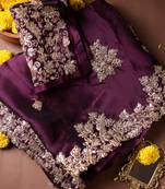 Purple embroidered chiffon saree.
