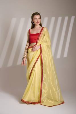 Yellow glamorous twill net solid partywear saree 1