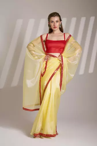 Yellow glamorous twill net solid partywear saree