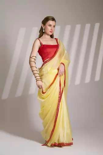 Yellow glamorous twill net solid partywear saree