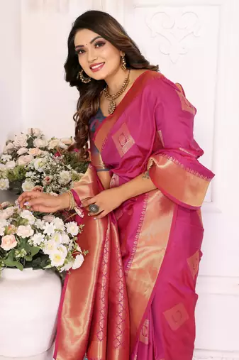 Pink graceful soft silk blend saree with woven zari work