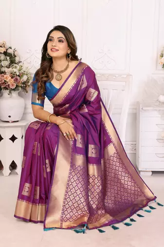Purple graceful soft silk blend saree with woven zari work