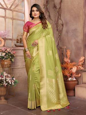Green graceful soft silk blend saree with woven zari work 1