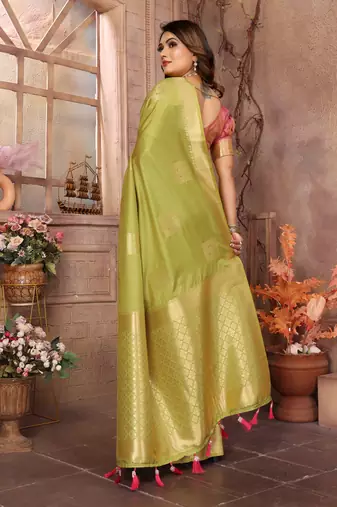 Green graceful soft silk blend saree with woven zari work