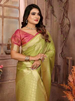 Green graceful soft silk blend saree with woven zari work 3