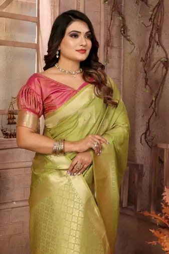 Green graceful soft silk blend saree with woven zari work
