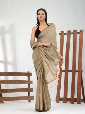 Beige cotton handspun soft saree with pompom 1