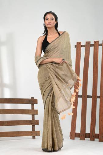 Beige cotton handspun soft saree with pompom