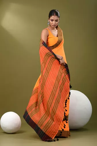 Orange cotton soft saree with solid pattern