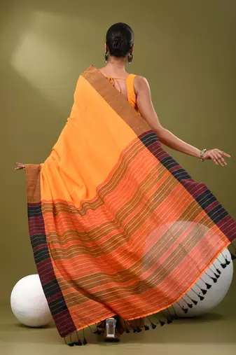 Orange cotton soft saree with solid pattern