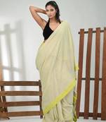 Tea green cotton soft saree with solid pattern
