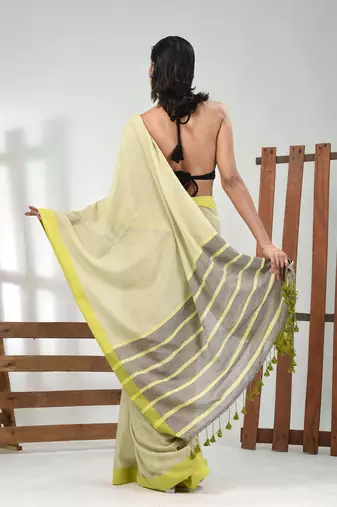 Tea green cotton soft saree with solid pattern