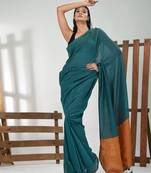 Teal cotton soft saree with solid pattern