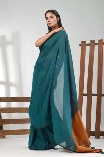 Teal cotton soft saree with solid pattern