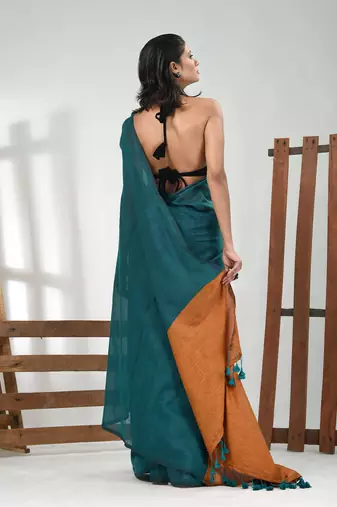 Teal cotton soft saree with solid pattern
