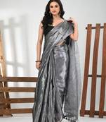Steel grey tissue soft saree with pompom
