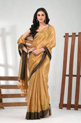 Golden tissue soft saree with pompom