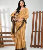 Golden tissue soft saree with pompom