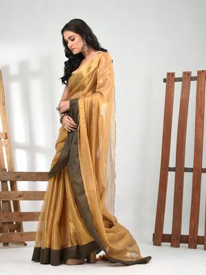 Golden tissue soft saree with pompom 2
