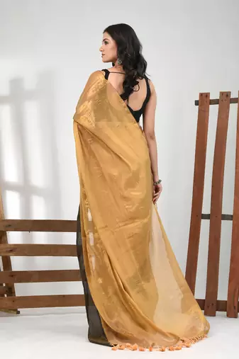 Golden tissue soft saree with pompom