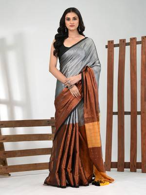 Grey and copper tissue soft saree with pompom 1