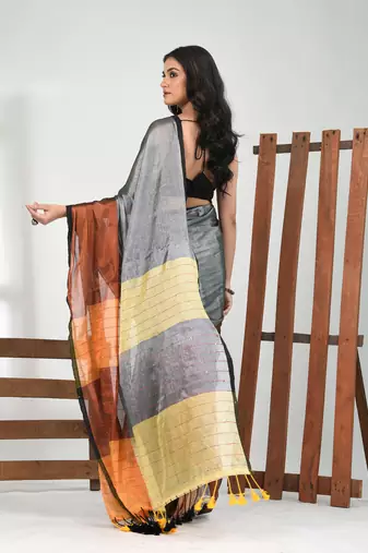 Grey and copper tissue soft saree with pompom