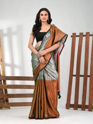 Grey and copper tissue soft saree with pompom 1
