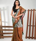 Grey and copper tissue soft saree with pompom