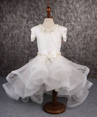White dress with detachable drape. 1