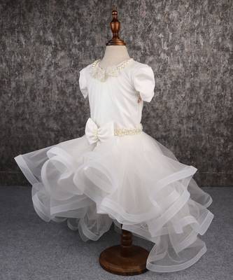 White dress with detachable drape. 3