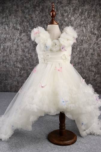 Butterfly net off white trail dress with matching bow hair clip