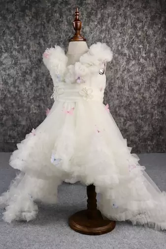 Butterfly net off white trail dress with matching bow hair clip