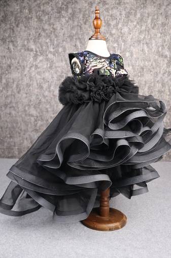 Beautiful ruffle net black gown with drape