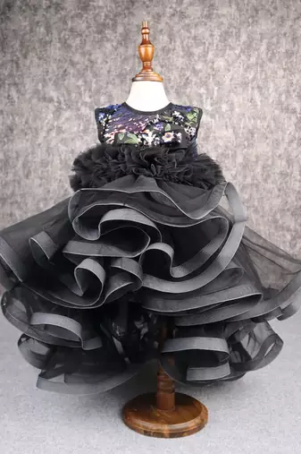 Beautiful ruffle net black gown with drape