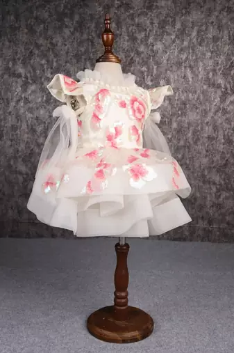 Exquisite sequined off white dress with back knot