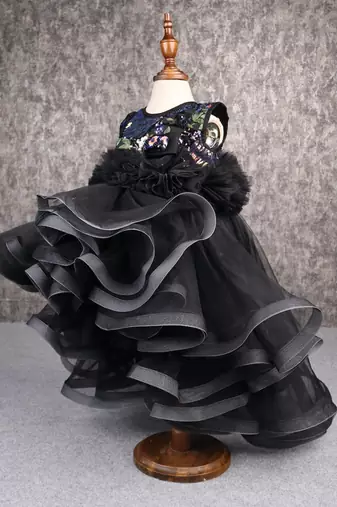 Beautiful ruffle net black gown with drape
