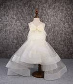 Stylish off white trail dress with bowie pearl string hair clip