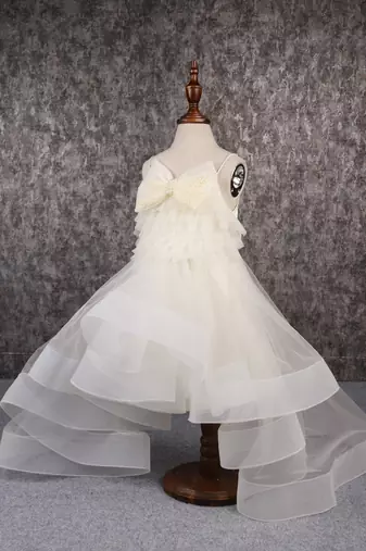 Stylish off white trail dress with bowie pearl string hair clip