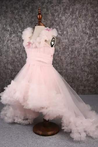 Butterfly adorned pink trail gown