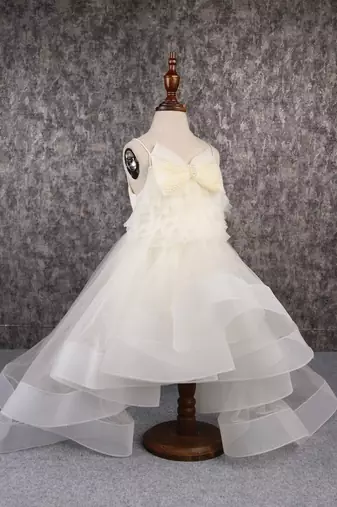 Stylish off white trail dress with bowie pearl string hair clip