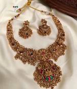 Gold lakshmi temple necklace set - bridal jewelry with ruby and emerald accents