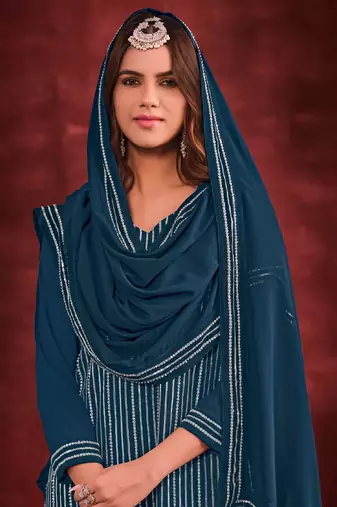 Teal blue embroidery and zarkan georgette straight sharara- free size stitched(size upto 42")
