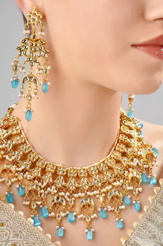 Gorgeous turquoise color kundan polki necklace set