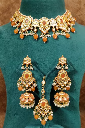 Orange kundan meenakari gold plated necklace set